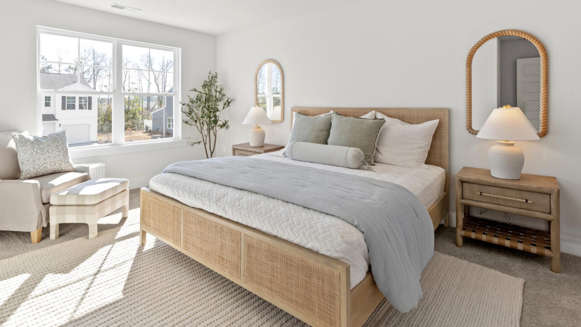 he second floor features the primary bedroom with a walk-in closet and double vanities.