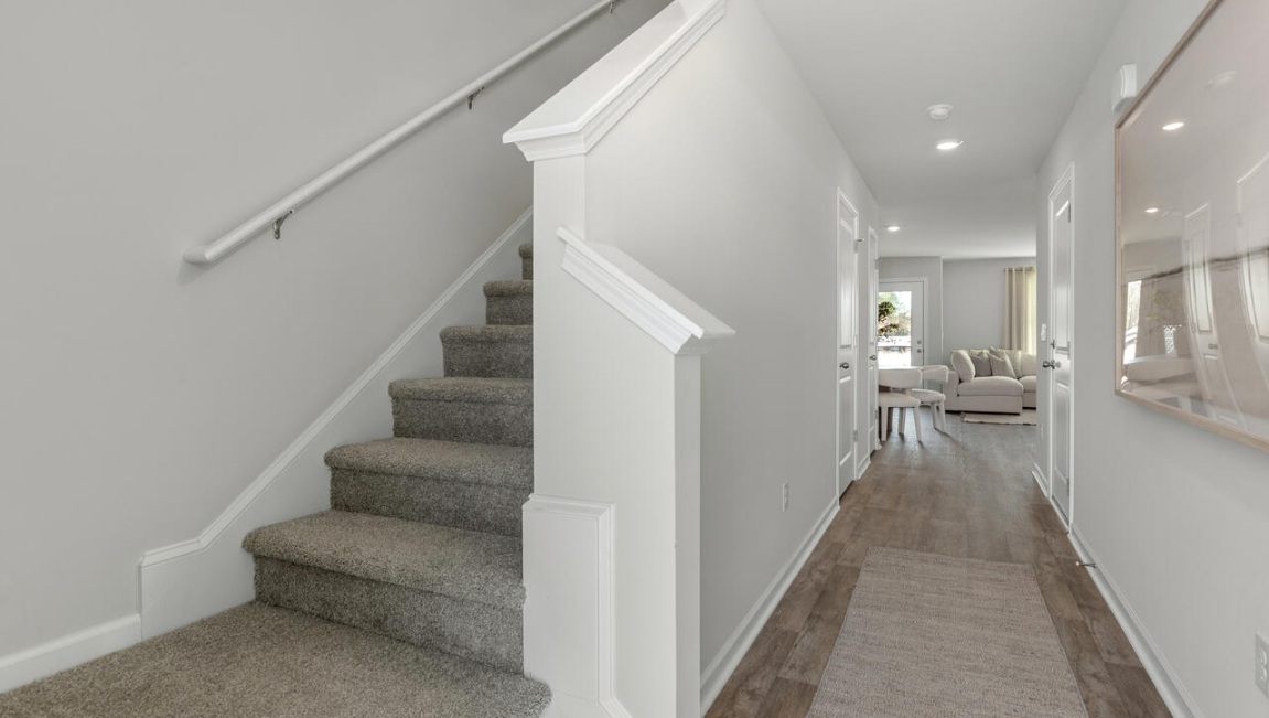 Your new Pearson features an open concept first floor anchored by a spacious kitchen with granite countertops, stainless steel appliances and a peninsula bar that overlooks your family and dining room. Ideal for entertaining guests or enjoying family time while preparing meals.