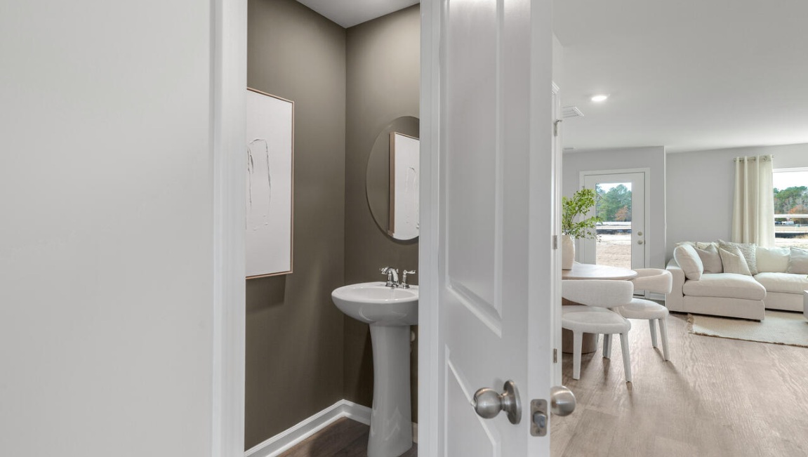 Your new Pearson features an open concept first floor anchored by a spacious kitchen with granite countertops, stainless steel appliances and a peninsula bar that overlooks your family and dining room. Ideal for entertaining guests or enjoying family time while preparing meals.