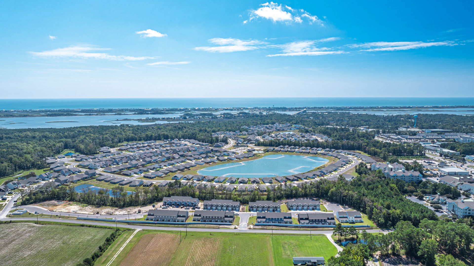he white sand beaches and the beautiful bluish green waters of the Atlantic Ocean offer a perfect combination of adventure and relaxation. An almost year around mild climate means you can enjoy the warm salty air and all that the area offers year-round. Your new home at Waterside is less than a mile to the new high-rise bridge with a pedestrian lane