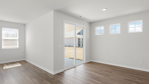 New Homes in Surf City, NC, The Darby gives you 3 bedrooms on the main level with LVP throughout the downstairs. Amenities. Pool. Paviilon. Tot Lot. Vollebyall. Beach