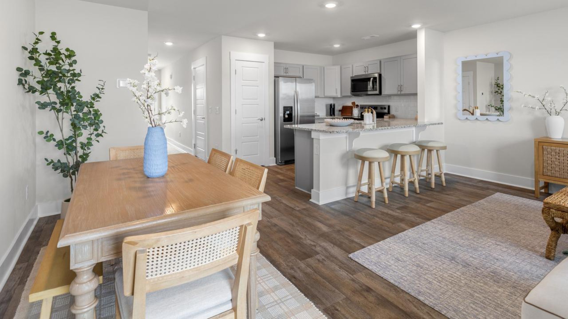 Step inside and discover a bright and airy open floor plan designed for both relaxing and entertaining. The kitchen is a showstopper with granite countertops, stainless steel appliances that are as durable as they are dazzling