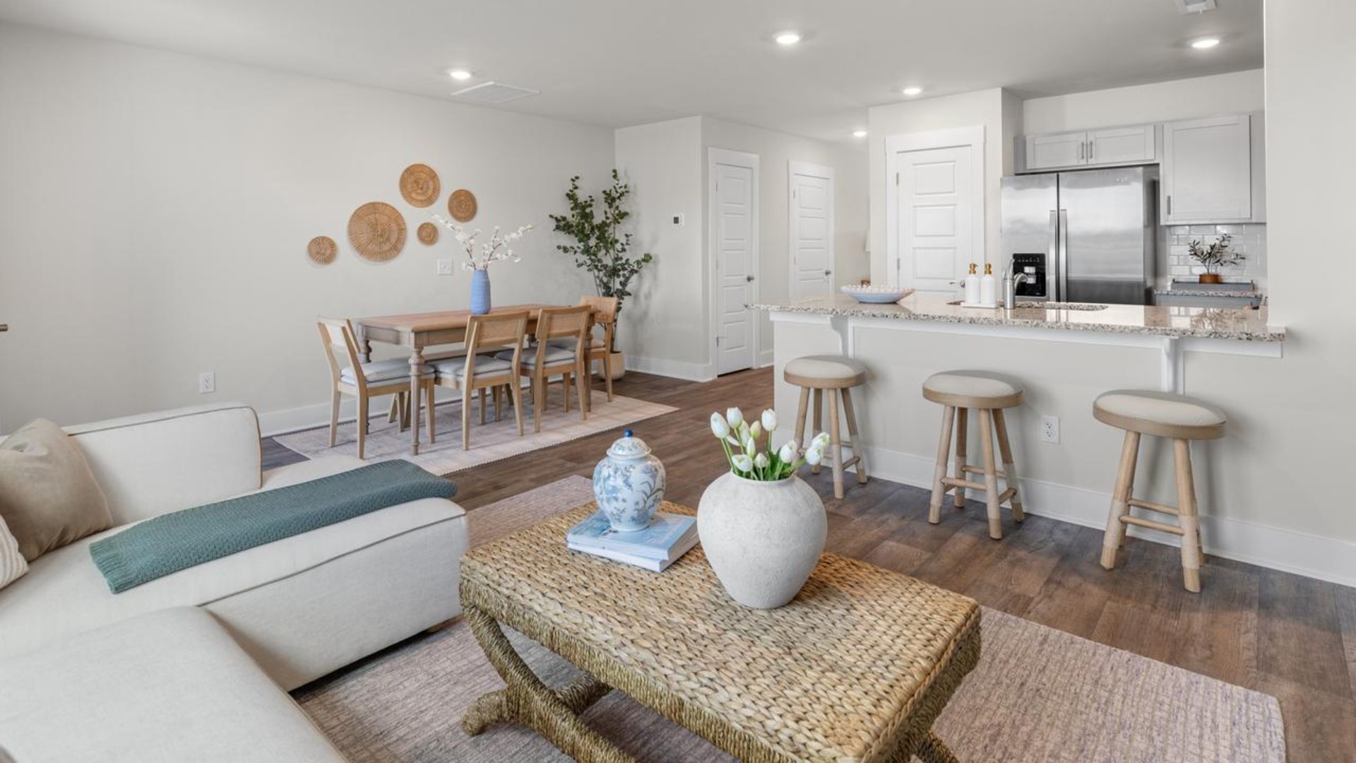 Step inside and discover a bright and airy open floor plan designed for both relaxing and entertaining. The kitchen is a showstopper with granite countertops, stainless steel appliances that are as durable as they are dazzling
