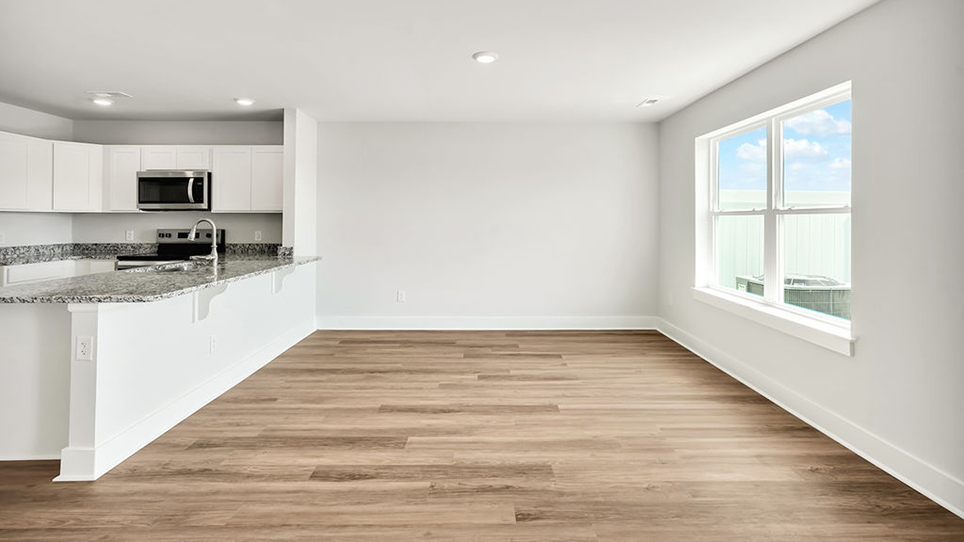 Step inside and discover a bright and airy open floor plan designed for both relaxing and entertaining.