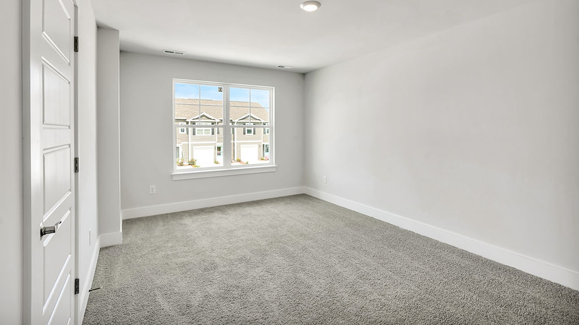 The second floor features the primary bedroom with a walk-in closet and double vanities. I