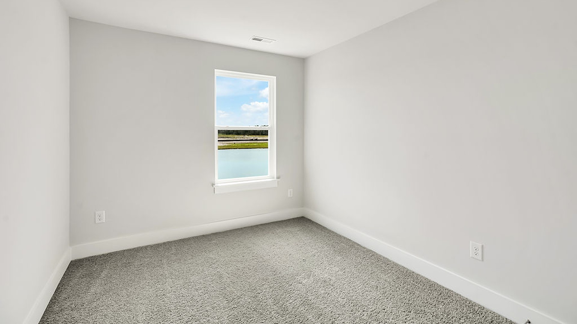 It also includes two additional bedrooms, a shared bathroom, and a laundry room for convenience.