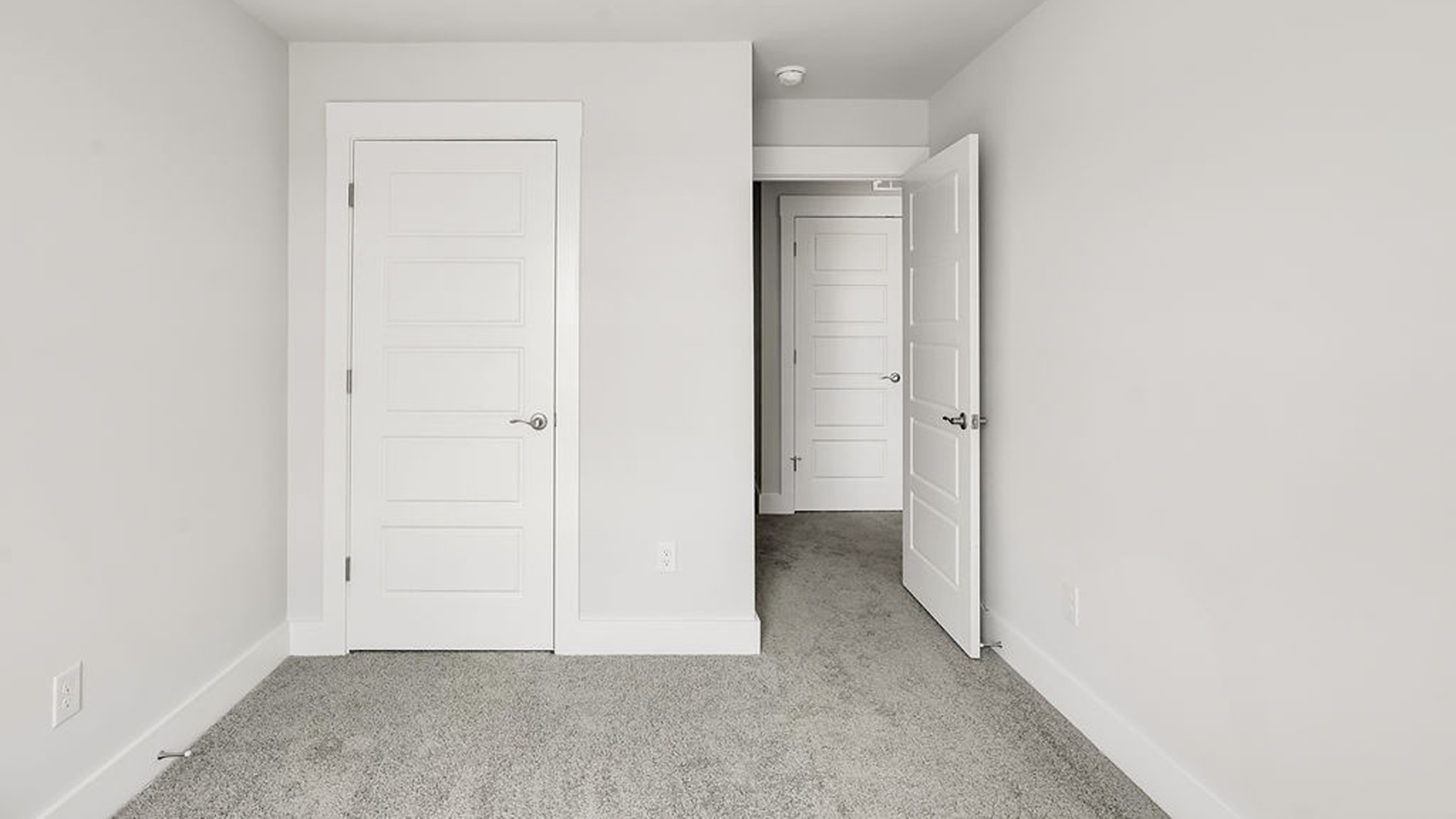 It also includes two additional bedrooms, a shared bathroom, and a laundry room for convenience.