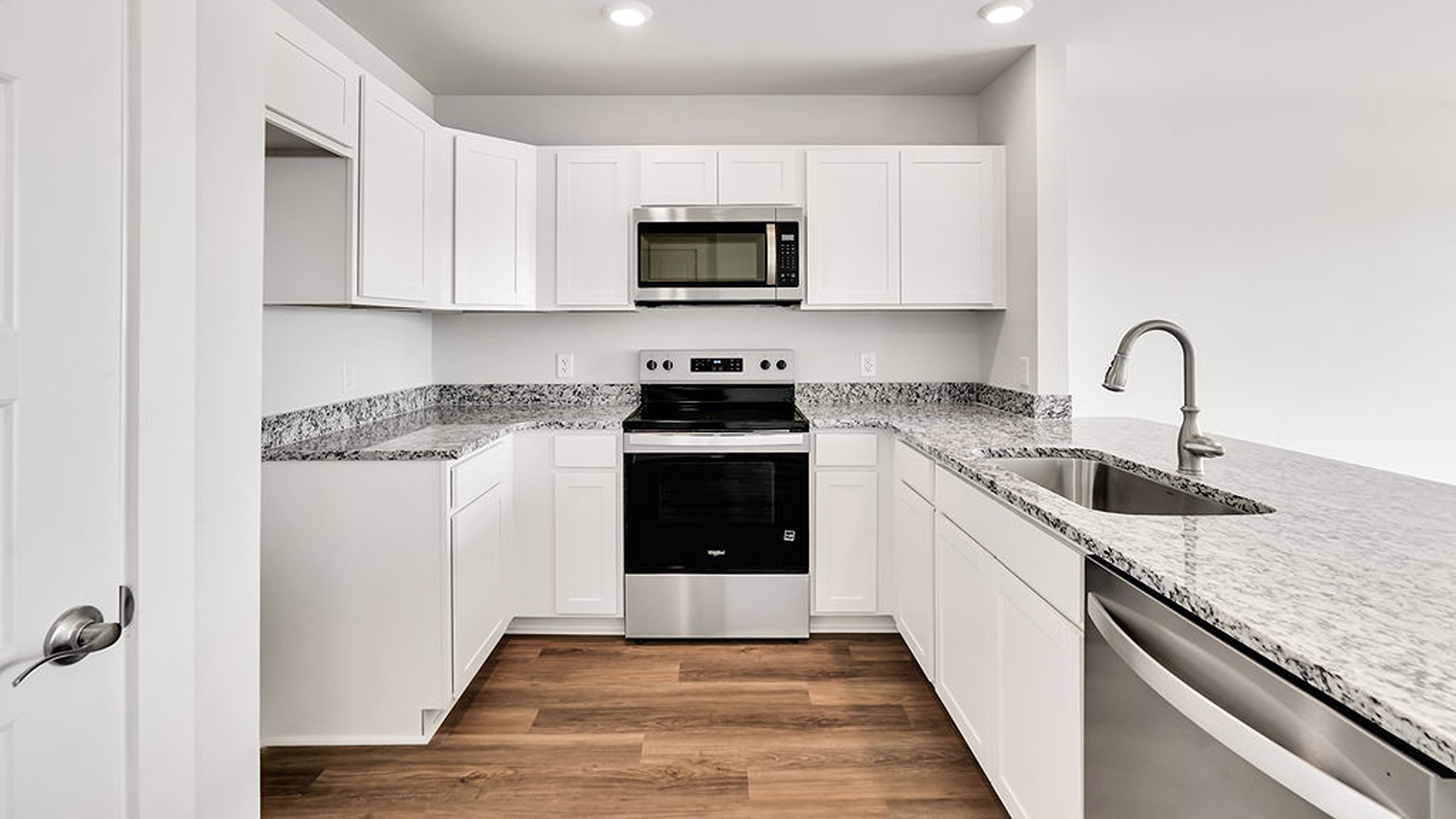The kitchen is a showstopper with granite countertops, stainless steel appliances that are as durable as they are dazzling.