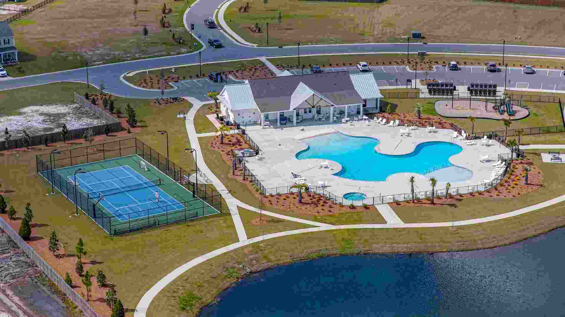 Homeowners will enjoy a resort style swimming pool, clubhouse with fitness room, golf simulator, full kitchen, firepit area, multi-game court, discovery playground and amenity pond.