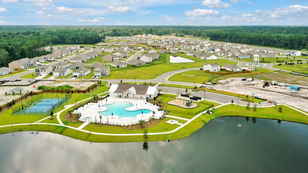 Homeowners will enjoy a resort style swimming pool, clubhouse with full kitchen, fitness room, simulated golf, pool table, fire pit area, multi-game court, discovery playground and amenity pond.