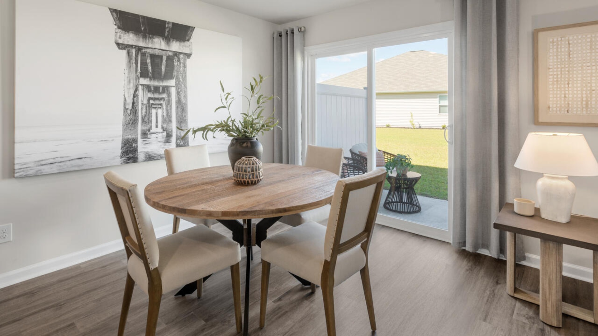 Your new Mitchell features an open concept first floor anchored by a spacious kitchen with a peninsula bar that overlooks your family and dining room.