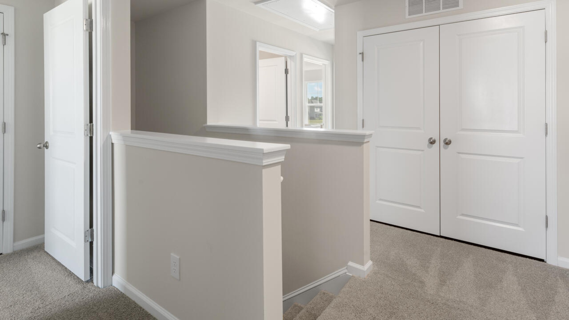 Your new Mitchell features an open concept first floor anchored by a spacious kitchen with a peninsula bar that overlooks your family and dining room.