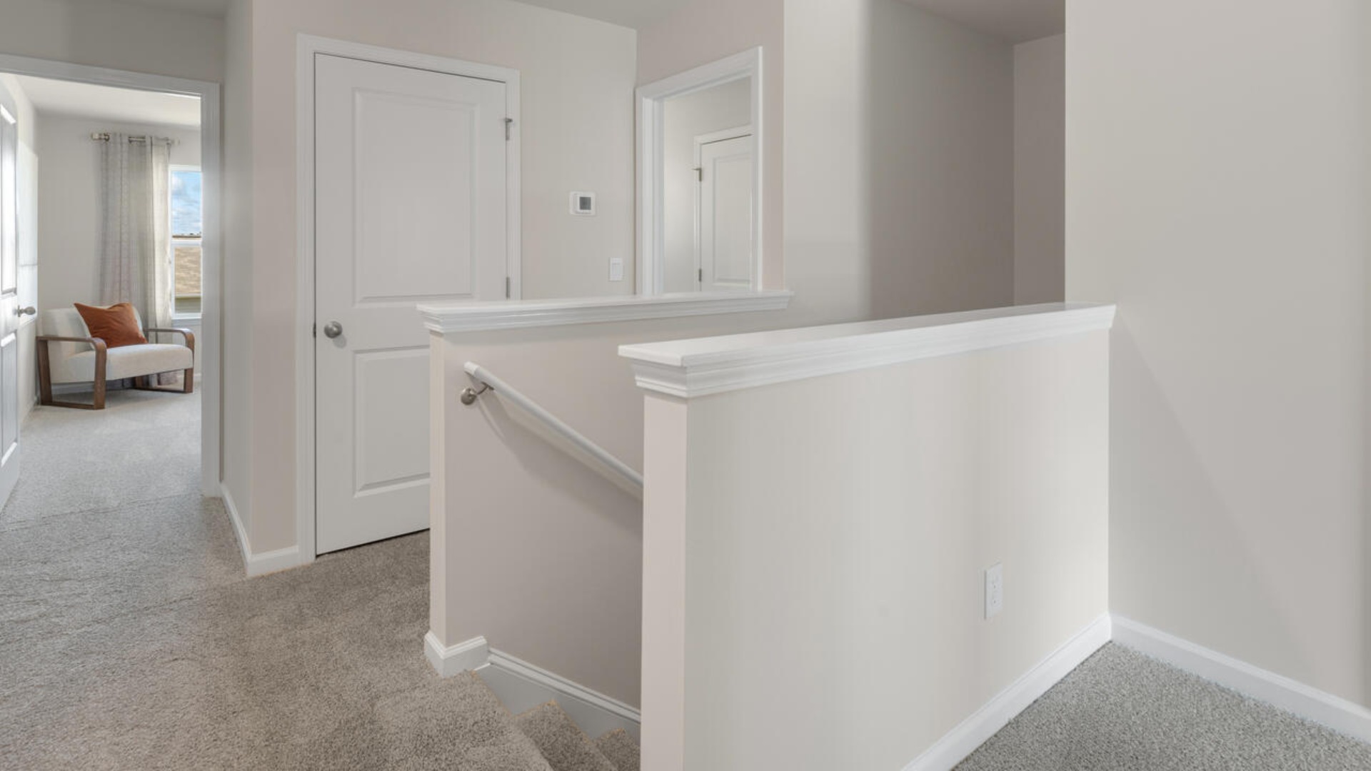 Your new Mitchell features an open concept first floor anchored by a spacious kitchen with a peninsula bar that overlooks your family and dining room.