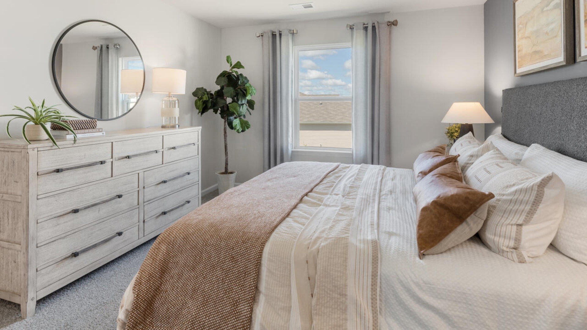 Your new Mitchell features an open concept first floor anchored by a spacious kitchen with a peninsula bar that overlooks your family and dining room.