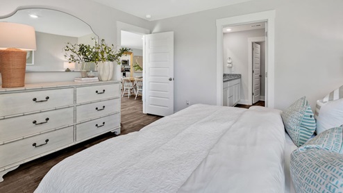 The primary bedroom has its own attached bathroom that features a walk-in closet and all the space you need to get ready in the morning. Sharing a sink isn’t a worry with the double vanity, and you also get additional privacy with a separate door for the toilet and shower.