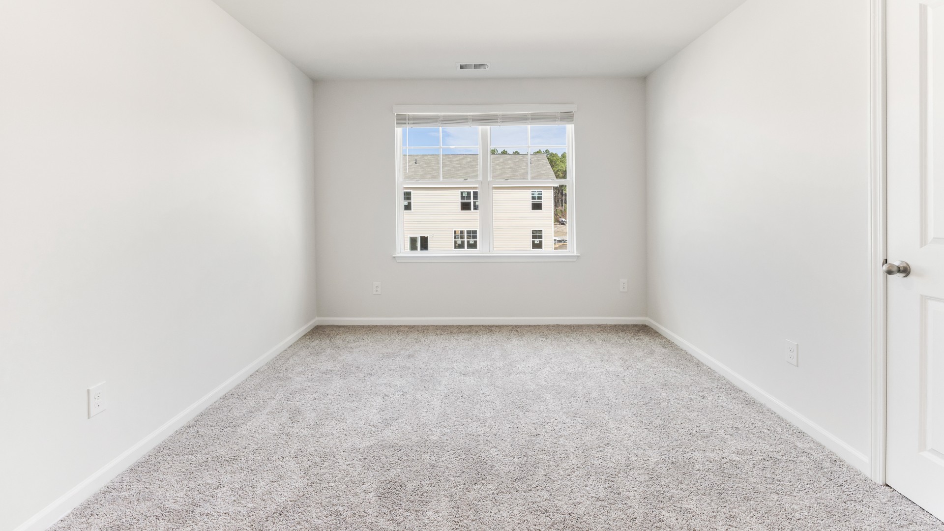 The upstairs has an additional living space, a laundry room, and a Primary Bedroom. Downstairs, a flex room can be used as an office or sitting area. In every bedroom you’ll have carpeted floors and a closet in each room. Whether these rooms become bedrooms, office spaces, or other bonus rooms, there is sure to be comfort.