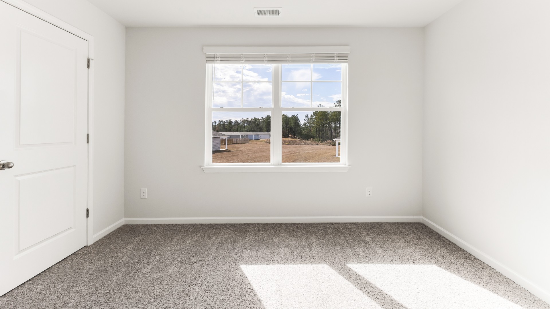 The upstairs has an additional living space, a laundry room, and a Primary Bedroom. Downstairs, a flex room can be used as an office or sitting area. In every bedroom you’ll have carpeted floors and a closet in each room. Whether these rooms become bedrooms, office spaces, or other bonus rooms, there is sure to be comfort.