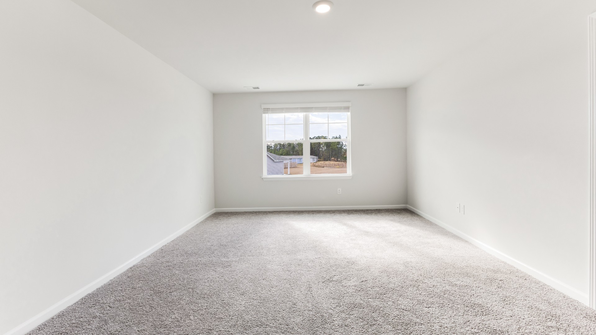 The upstairs has an additional living space, a laundry room, and a Primary Bedroom. Downstairs, a flex room can be used as an office or sitting area. In every bedroom you’ll have carpeted floors and a closet in each room. Whether these rooms become bedrooms, office spaces, or other bonus rooms, there is sure to be comfort.