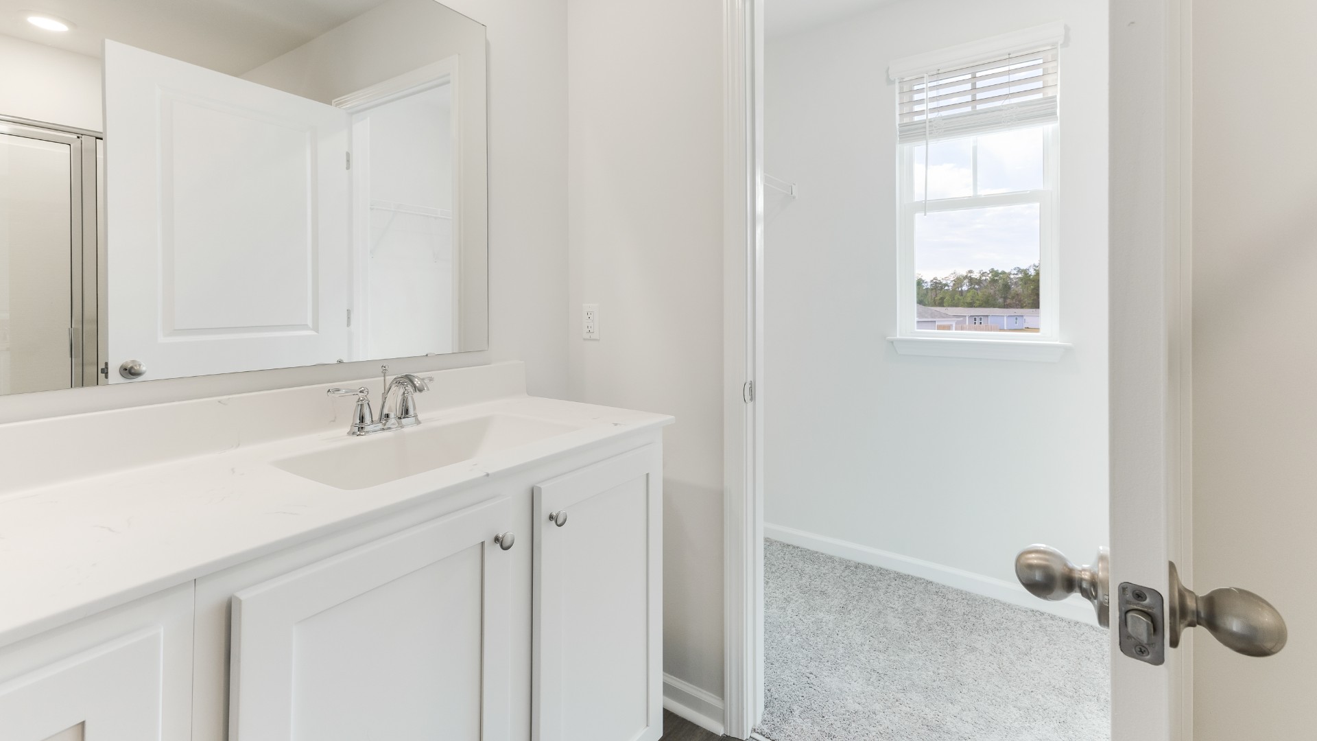 The upstairs has an additional living space, a laundry room, and a Primary Bedroom. Downstairs, a flex room can be used as an office or sitting area. In every bedroom you’ll have carpeted floors and a closet in each room. Whether these rooms become bedrooms, office spaces, or other bonus rooms, there is sure to be comfort.