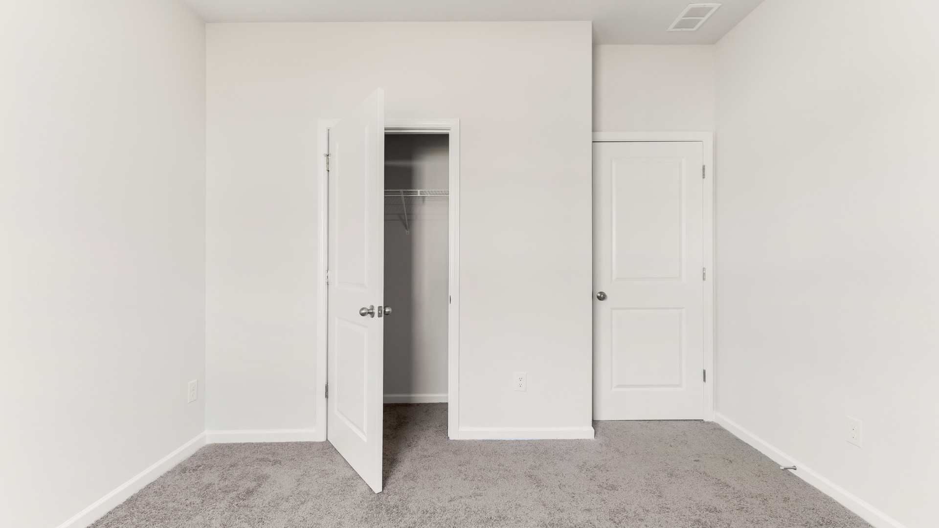 The upstairs has an additional living space, a laundry room, and a Primary Bedroom. Downstairs, a flex room can be used as an office or sitting area. In every bedroom you’ll have carpeted floors and a closet in each room. Whether these rooms become bedrooms, office spaces, or other bonus rooms, there is sure to be comfort.