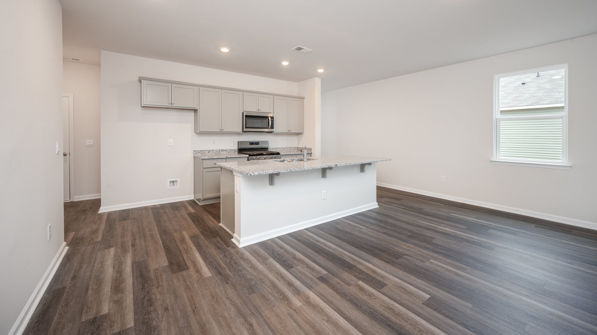 The living area is an open concept, where your kitchen, living, and dining areas blend seamlessly into a space perfect for everyday living and entertaining.