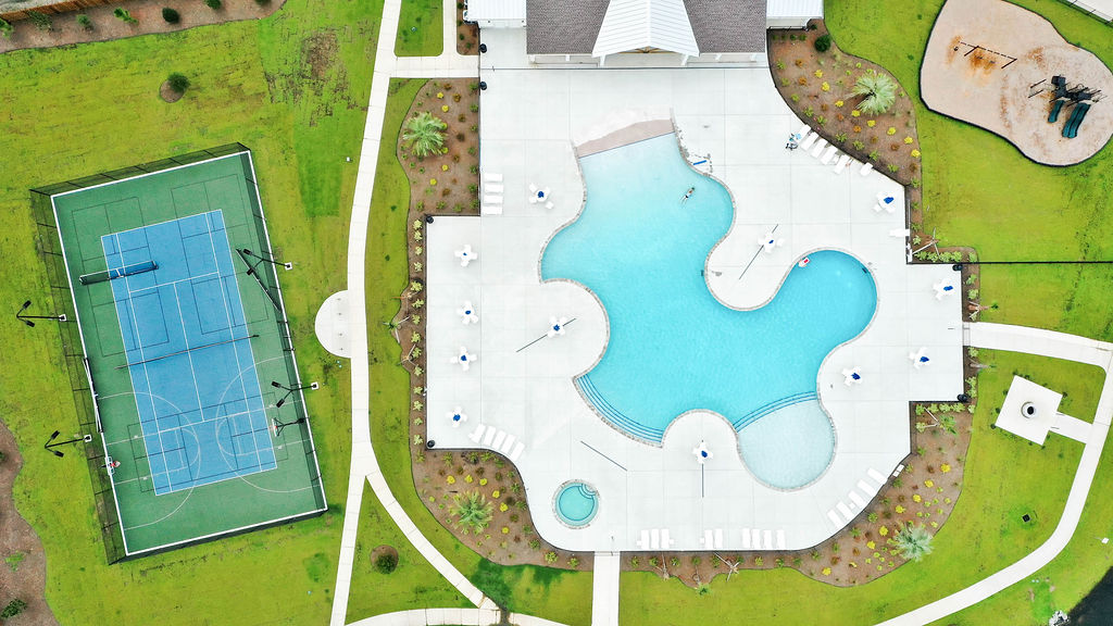 Homeowners will enjoy a resort style swimming pool, clubhouse with full kitchen, fitness room, simulated golf, pool table, fire pit area, multi-game court, discovery playground and amenity pond.