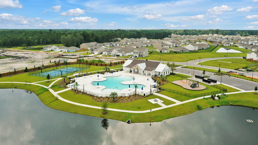 Homeowners will enjoy a resort style swimming pool, clubhouse with full kitchen, fitness room, simulated golf, pool table, fire pit area, multi-game court, discovery playground and amenity pond.