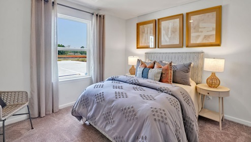 kitchen equipped with Granite countertops, Stainless Steel Appliances, including a smooth-top electric range, microwave, and dishwasher.