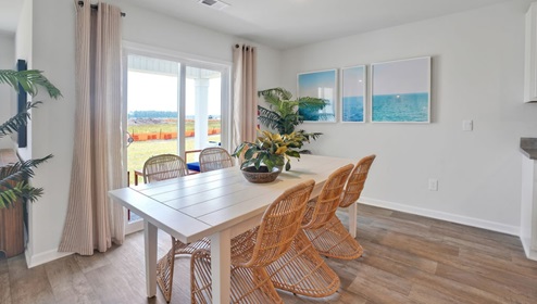 kitchen equipped with Granite countertops, Stainless Steel Appliances, including a smooth-top electric range, microwave, and dishwasher.