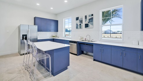 Clubhouse with dining room, kitchen, living room. Open area. Television.