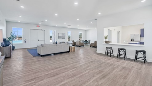 Residents will enjoy a resort style swimming pool, clubhouse with fitness room, fire pit area, multi-game court, discovery playground and amenity pond.