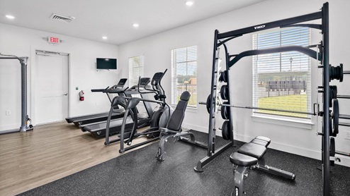 Clubhouse with Fitness Center offers free weights, universal equipment, treadmills, stationary bikes, and StairMasters, along with personal