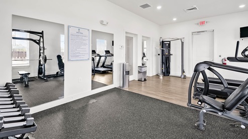 Clubhouse with Fitness Center offers free weights, universal equipment, treadmills, stationary bikes, and StairMasters, along with personal