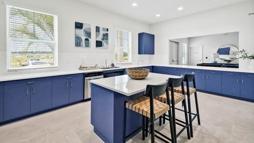 Clubhouse with dining room, kitchen, living room. Open area. Television.