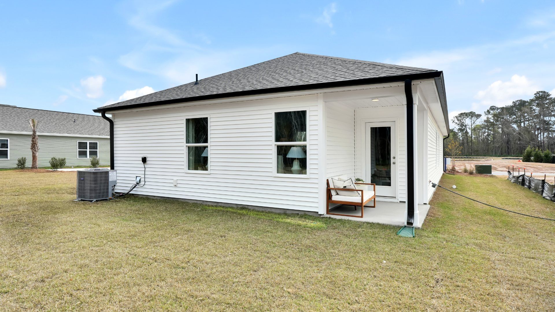 Enjoy the covered porch perfect for entertaining and enjoying the Carolina evenings.