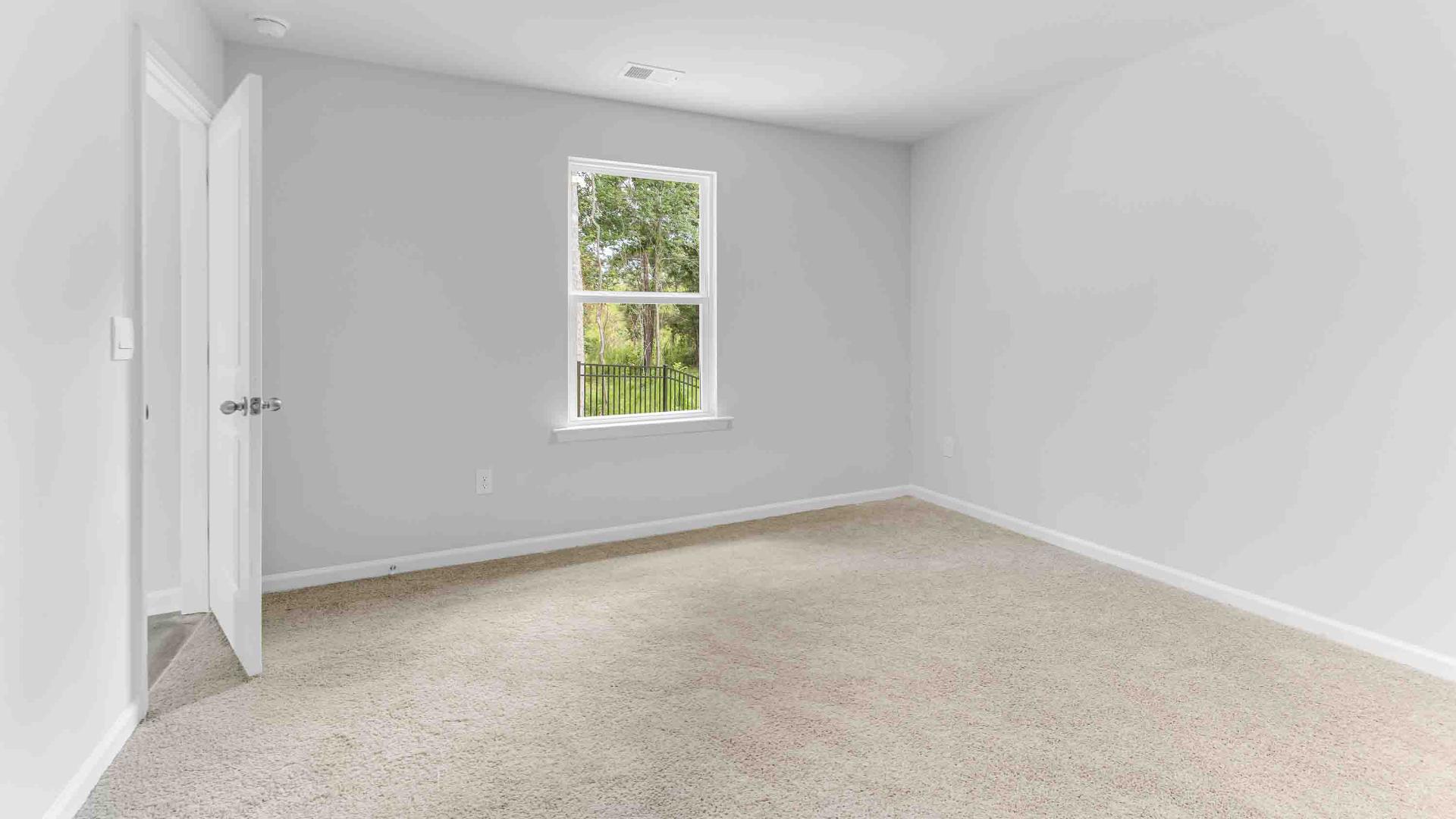 The two bathrooms feature granite countertops. The primary suite has a spacious bedroom with a walk in closet, and the bath has a walk in shower. Architectural shingles, garage door opener, and screens on all windows!