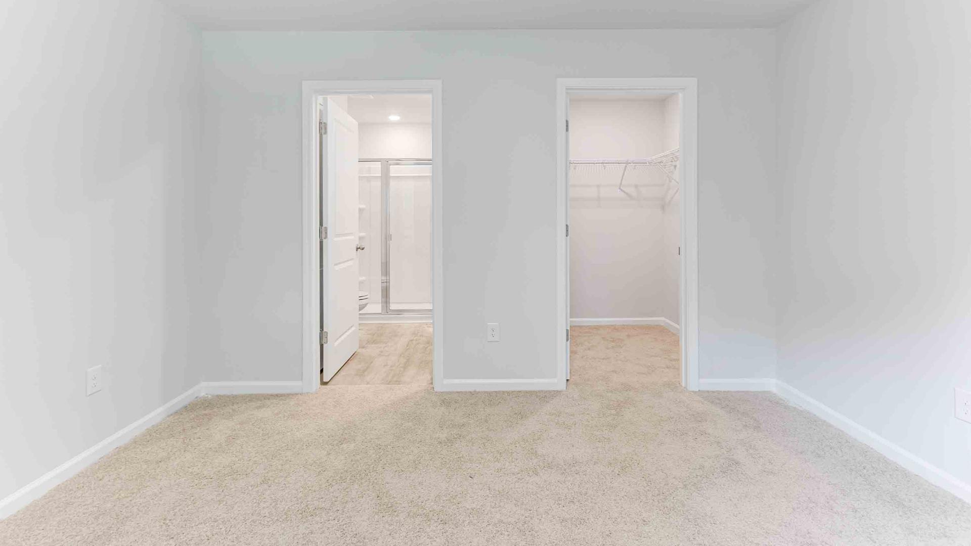 The two bathrooms feature granite countertops. The primary suite has a spacious bedroom with a walk in closet, and the bath has a walk in shower. Architectural shingles, garage door opener, and screens on all windows!