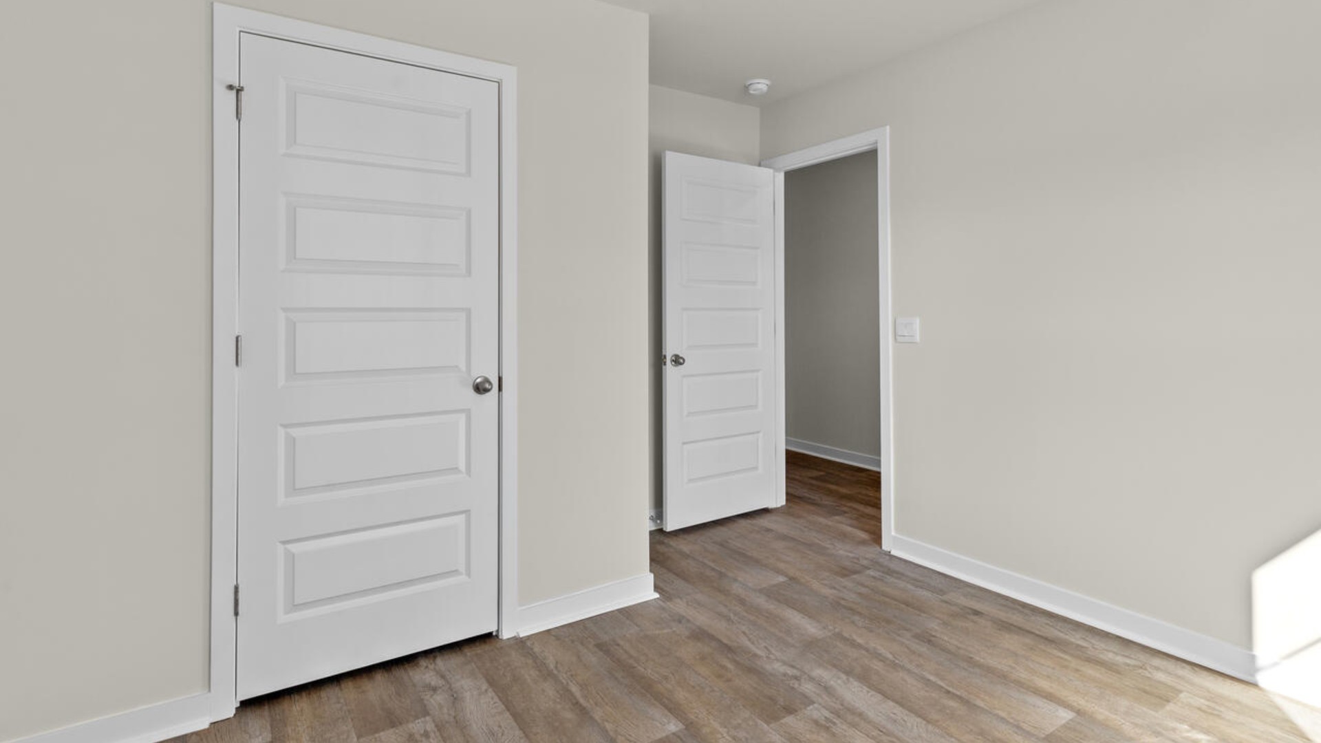 There are two additional bedrooms and bath. In every bedroom you’ll have vinyl floors and a closet in each room. Whether these rooms become bedrooms, office spaces, or other bonus rooms,