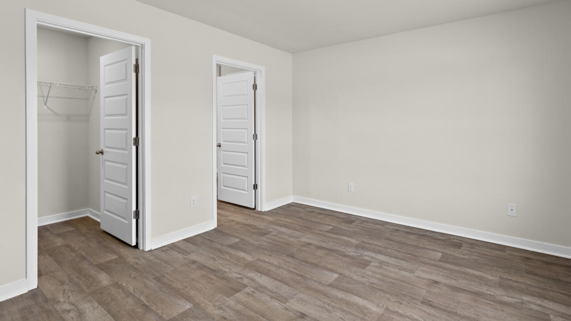 The primary bedroom has its own attached bathroom that features a walk-in closet and all the space you need to get ready in the morning. Sharing a sink isn’t a worry with the double vanity, and you also get additional privacy with a separate door for the toilet and shower.