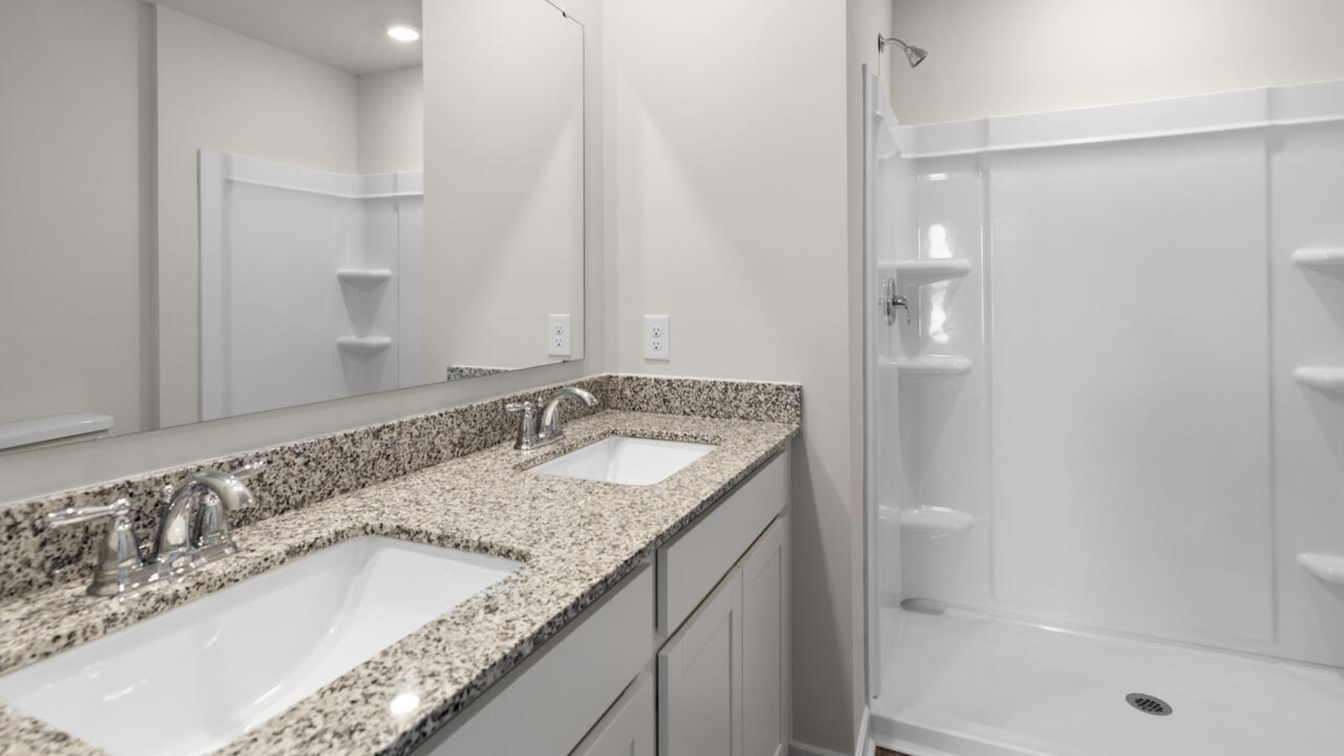 The primary bedroom has its own attached bathroom that features a walk-in closet and all the space you need to get ready in the morning. Sharing a sink isn’t a worry with the double vanity, and you also get additional privacy with a separate door for the toilet and shower.