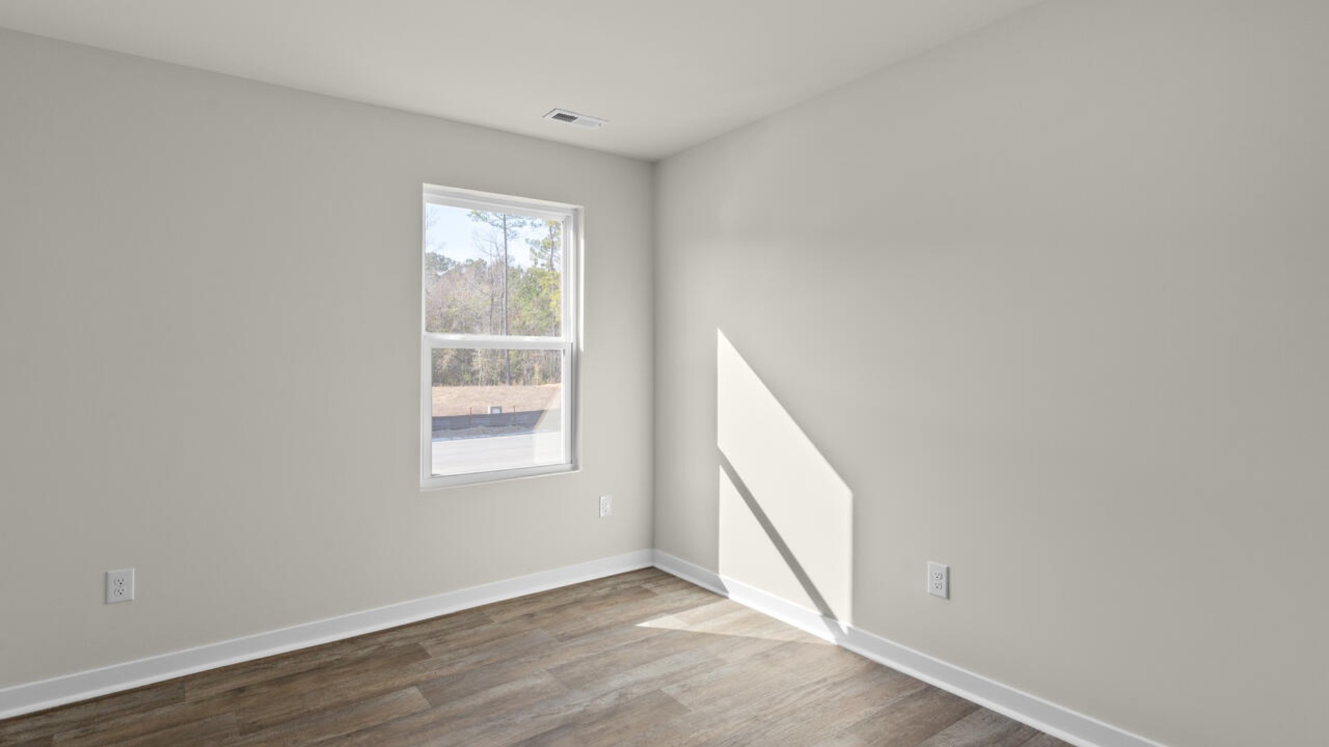 There are two additional bedrooms and bath. In every bedroom you’ll have vinyl floors and a closet in each room. Whether these rooms become bedrooms, office spaces, or other bonus rooms,