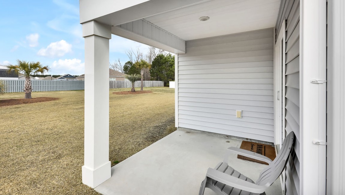 Enjoy the covered porch perfect for entertaining and enjoying the Carolina evenings.