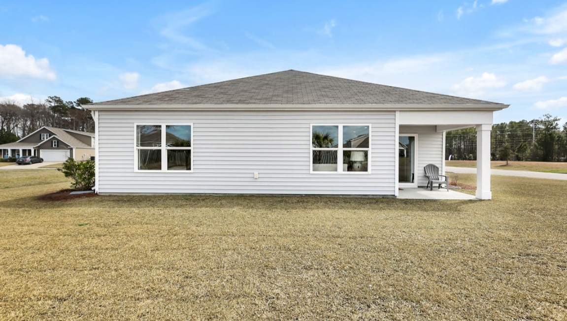 Enjoy the covered porch perfect for entertaining and enjoying the Carolina evenings.