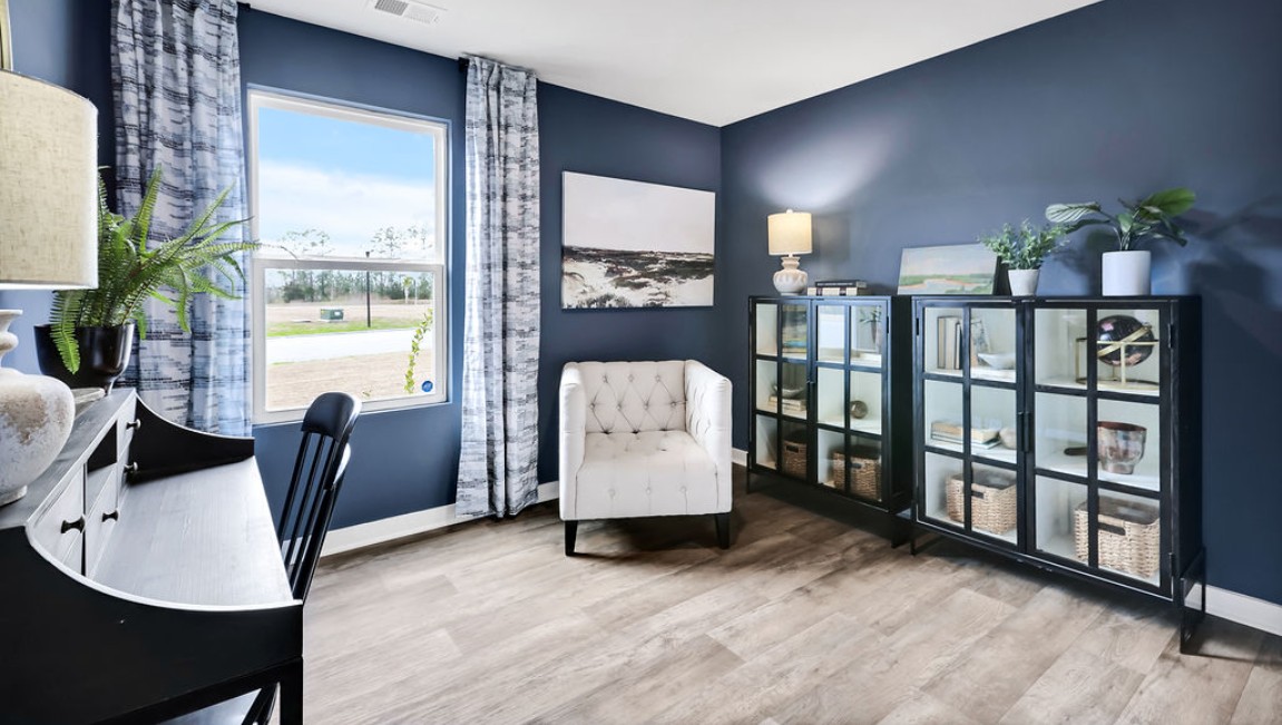 At the front are two guest bedrooms and a full bathroom, perfect for visitors or a home office.