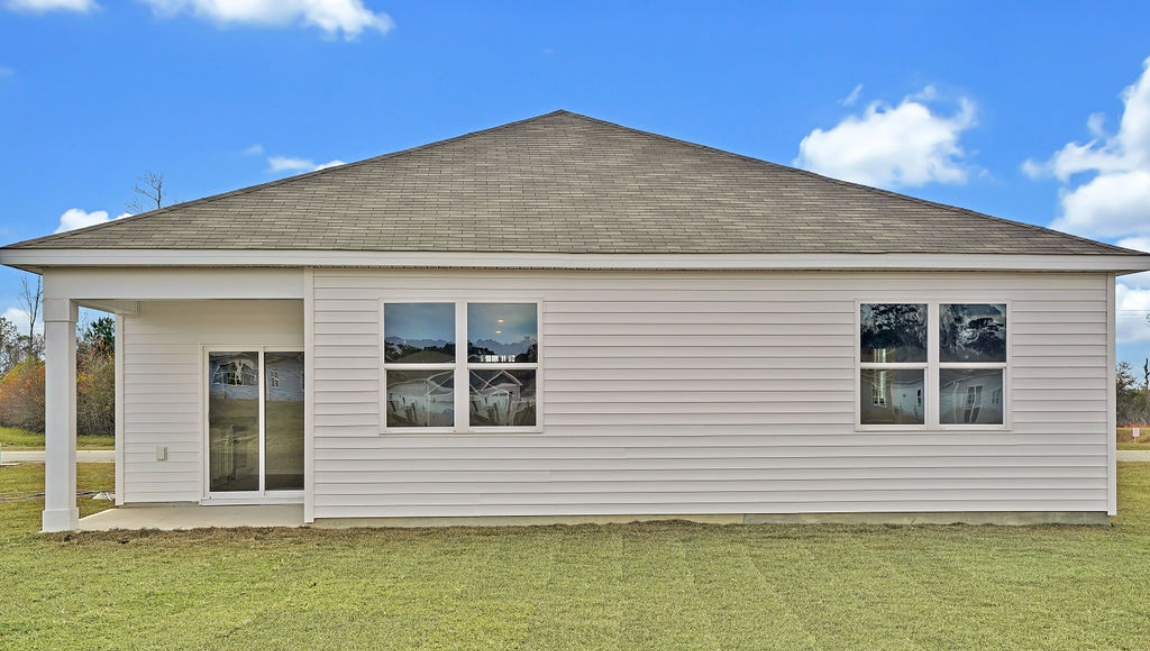 Enjoy the covered porch perfect for entertaining and enjoying the Carolina evenings