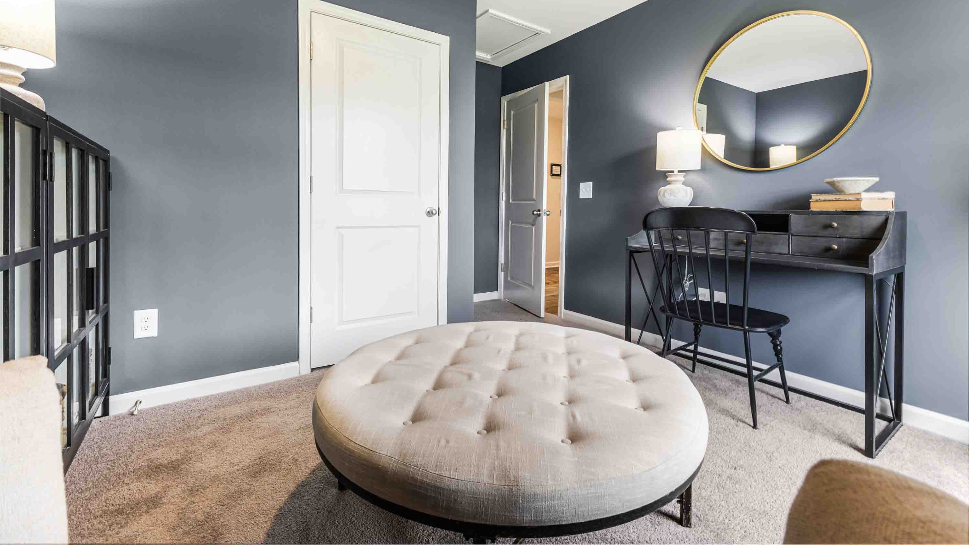 At the front are two guest bedrooms and a full bathroom, perfect for visitors or a home office.