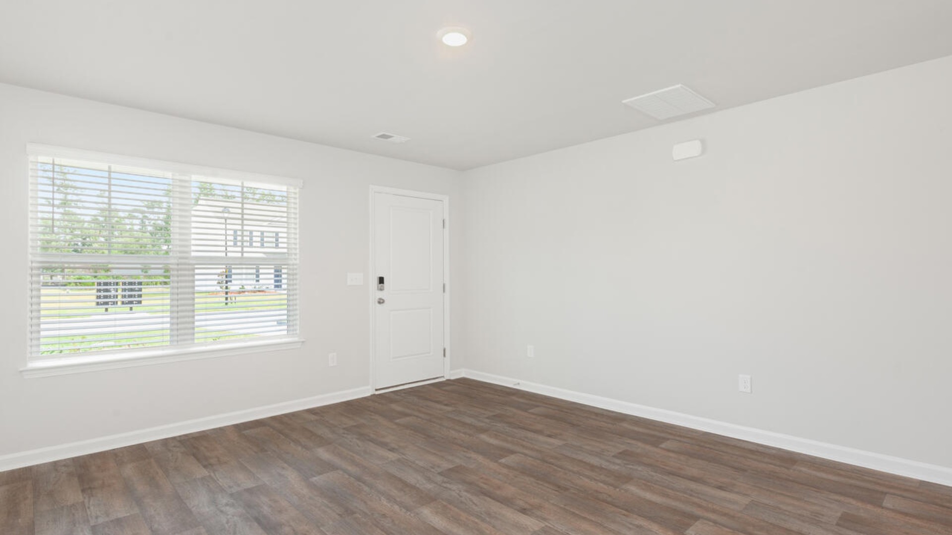 The Brandon offers an open floorplan where the great room leads into the dining room. The adjoining kitchen has a breakfast bar and pantry. Primary Suite with Deluxe Bath. Walk in closet off Primary Bath.