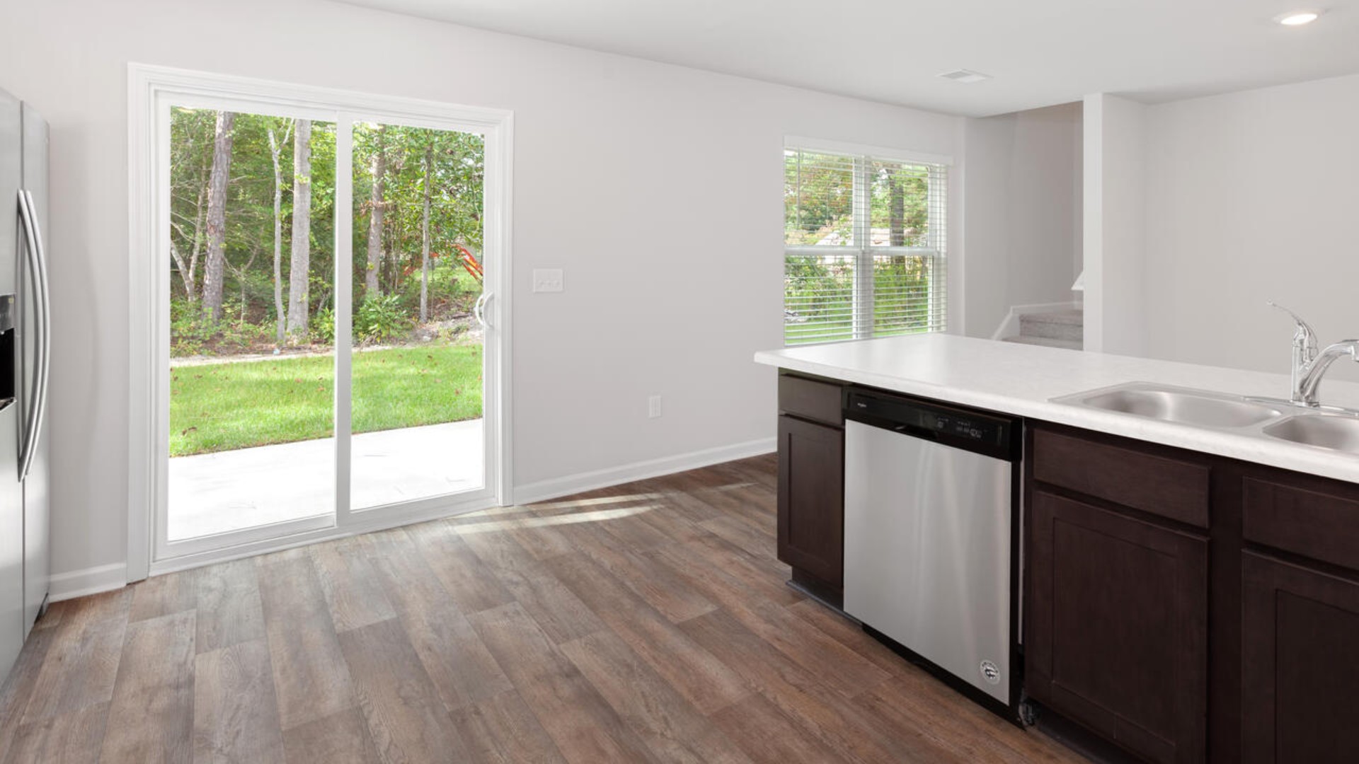 The Brandon offers an open floorplan where the great room leads into the dining room. The adjoining kitchen has a breakfast bar and pantry. Primary Suite with Deluxe Bath. Walk in closet off Primary Bath.