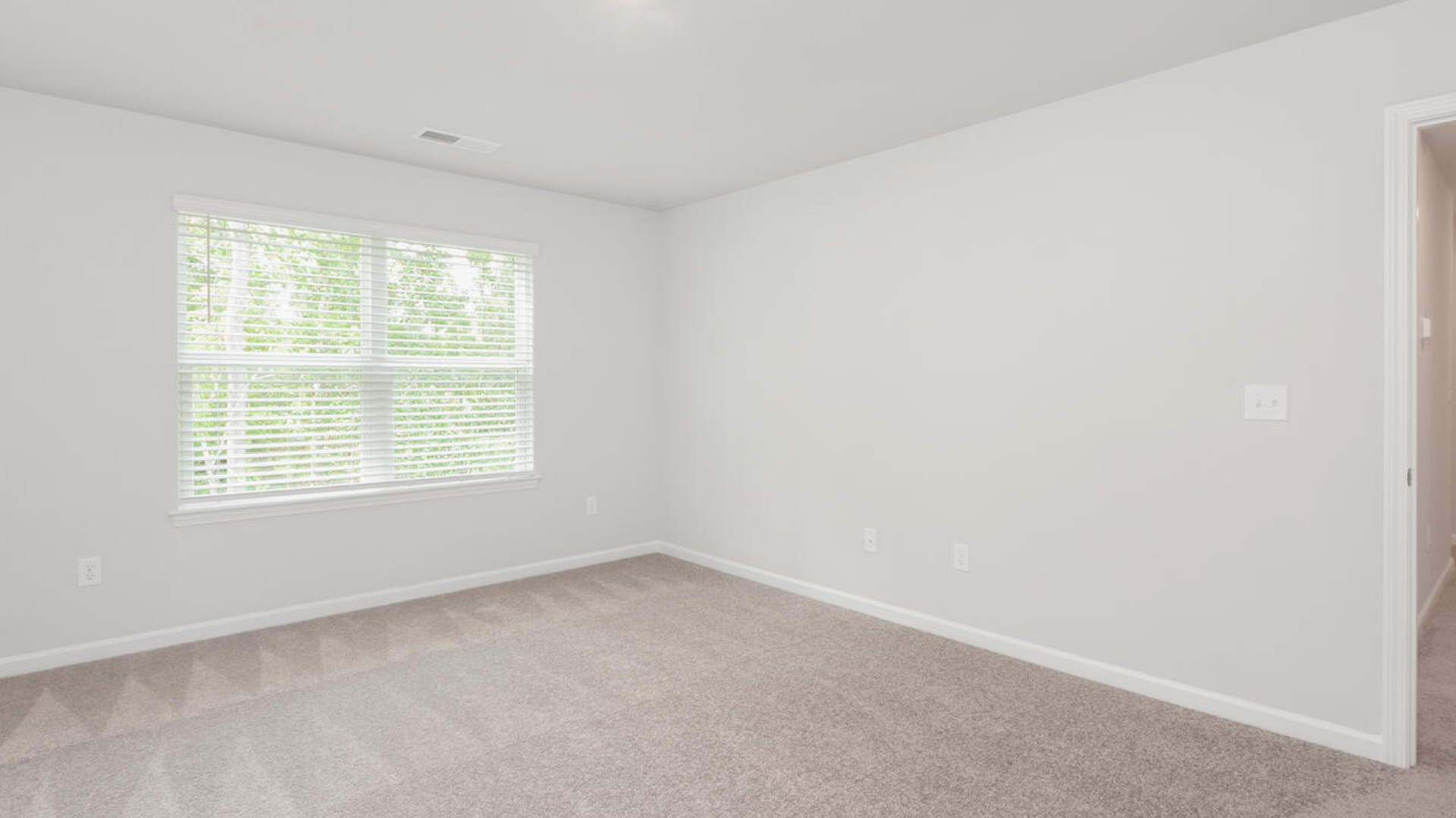 The Brandon offers an open floorplan where the great room leads into the dining room. The adjoining kitchen has a breakfast bar and pantry. Primary Suite with Deluxe Bath. Walk in closet off Primary Bath.