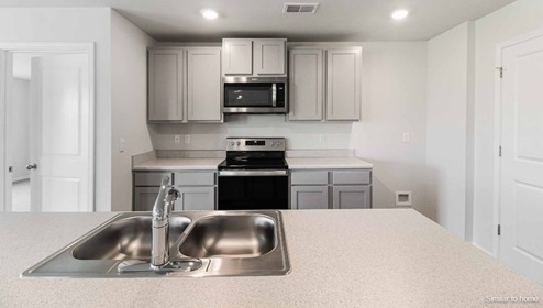 homes, such as granite countertops in the kitchen, garage door openers real estate bolivia nc